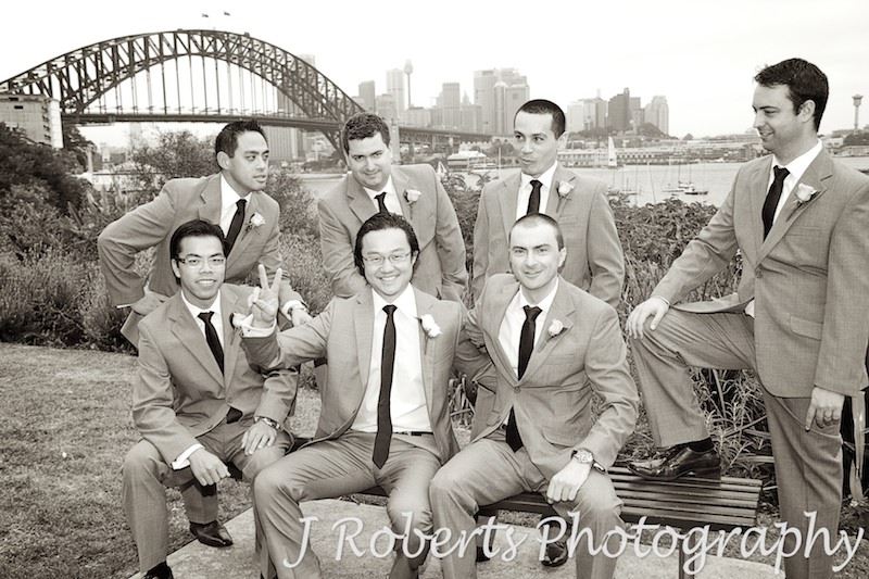 Groom and groomsmen at Lavender Bay Reserve in Sepia - wedding photography sydney